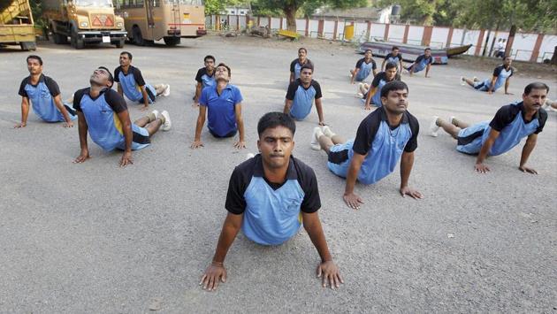 Provincial Armed Constabulary javans perform yoga on the banks of Yamuna river in Allahabad, Uttar Pradesh on June 14, 2017. (PTI) Provincial Armed Constabulary javans perform yoga on the banks of Yamuna river in Allahabad, Uttar Pradesh on June 14, 2017. (PTI)