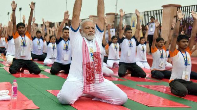 Prime Minister Narendra Modi performs yoga during the International Yoga Day in Lucknow on Wednesday. (PTI) Prime Minister Narendra Modi performs yoga during the International Yoga Day in Lucknow on Wednesday. (PTI)