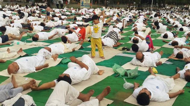 A child strikes a pose of his own during a Yoga Day session at Dwarka Park in New Delhi. (Vipin Kumar/HT Photo) A child strikes a pose of his own during a Yoga Day session at Dwarka Park in New Delhi. (Vipin Kumar/HT Photo)