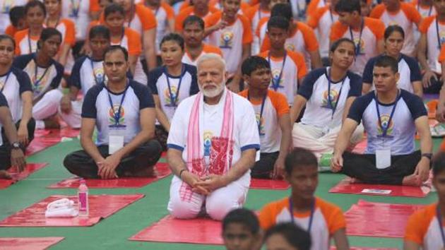 PM Narendra Modi takes part in the International Yoga Day celebrations in Lucknow on Wednesday. (CM Office, GoUP Twitter page) PM Narendra Modi takes part in the International Yoga Day celebrations in Lucknow on Wednesday. (CM Office, GoUP Twitter page)