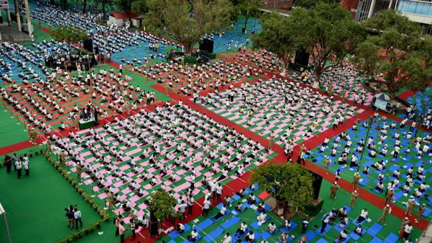 Chandigarh residents taking part in the International Yoga Day celebrations at the Sector 17 Plaza in Chandigarh on Wednesday morning. (Keshav Singh/HT) Chandigarh residents taking part in the International Yoga Day celebrations at the Sector 17 Plaza in Chandigarh on Wednesday morning. (Keshav Singh/HT)