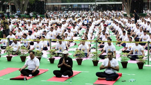From left: Union health minister JP Nadda , Punjab governor VP Singh Badnore and Chandigarh BJP chief Sanjay Tandon during the 3rd International Yoga day 2017 at Sector 17 Plaza in Chandigarh on Wednesday. (Keshav Singh/HT Photo) From left: Union health minister JP Nadda , Punjab governor VP Singh Badnore and Chandigarh BJP chief Sanjay Tandon during the 3rd International Yoga day 2017 at Sector 17 Plaza in Chandigarh on Wednesday. (Keshav Singh/HT Photo)