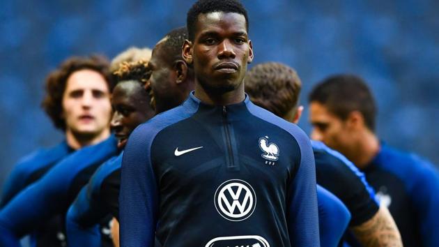 France's midfielder Paul Pogba attends a training session of the French national football team. (AFP) France's midfielder Paul Pogba attends a training session of the French national football team. (AFP)