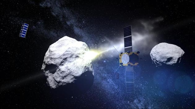 This computer generated handout image taken on May 15, 2015 and released by the European Space Agency (ESA) on May 15, 2015 shows the impact of the DART (Double Asteroid Redirection Test) projectile on the binary asteroid system (65803) Didymos observed by the AIM (Asteroid Impact Mission) satellite. (AFP File Photo) This computer generated handout image taken on May 15, 2015 and released by the European Space Agency (ESA) on May 15, 2015 shows the impact of the DART (Double Asteroid Redirection Test) projectile on the binary asteroid system (65803) Didymos observed by the AIM (Asteroid Impact Mission) satellite. (AFP File Photo)
