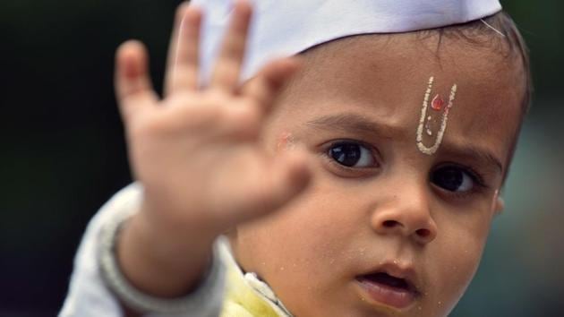 Wari is the annual pilgrimage from Alandi in Pune to Pandharpur in Solapur in the Hindu month of Aashaadh, around June-July. Devotees traverse a 250 km route and are called Warkaris. A young Warkari during Sant Dnyaneshwar Maharaj Palkhi Sohla at Vishrantwadi in Pune. (Pratham Gokhale/HT PHOTO) Wari is the annual pilgrimage from Alandi in Pune to Pandharpur in Solapur in the Hindu month of Aashaadh, around June-July. Devotees traverse a 250 km route and are called Warkaris. A young Warkari during Sant Dnyaneshwar Maharaj Palkhi Sohla at Vishrantwadi in Pune. (Pratham Gokhale/HT PHOTO)