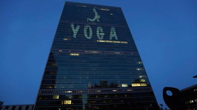 UN building lit up ahead of International Yoga Day on June 19, 2017. (PTI) UN building lit up ahead of International Yoga Day on June 19, 2017. (PTI)