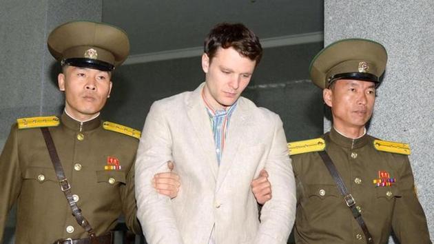 Otto Frederick Warmbier (C), a University of Virginia student who was detained in North Korea since early January, is taken to North Korea's top court in Pyongyang, North Korea, in this photo released by Kyodo March 16, 2016. (Reuters Photo)