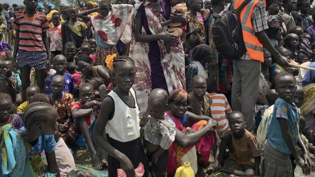 People line up to be registered with the World Food Programme (WFP) for food distribution in Old Fangak, in Jonglei state, one of the worst affected areas for food insecurity according to a food security report in South Sudan. (AP) People line up to be registered with the World Food Programme (WFP) for food distribution in Old Fangak, in Jonglei state, one of the worst affected areas for food insecurity according to a food security report in South Sudan. (AP)
