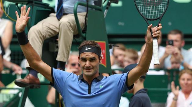 Roger Federer celebrates after the ATP Tennis matach against Japan's Yuichi Sugita in Halle.(AFP)