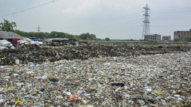 ‘With the approaching monsoon, the situation is going to get even worse as the garbage flows inside our houses, emitting an odour that is unbearable’ says one of the resident of Taimoor village. (Vansh Virmani/HT Photo) ‘With the approaching monsoon, the situation is going to get even worse as the garbage flows inside our houses, emitting an odour that is unbearable’ says one of the resident of Taimoor village. (Vansh Virmani/HT Photo)