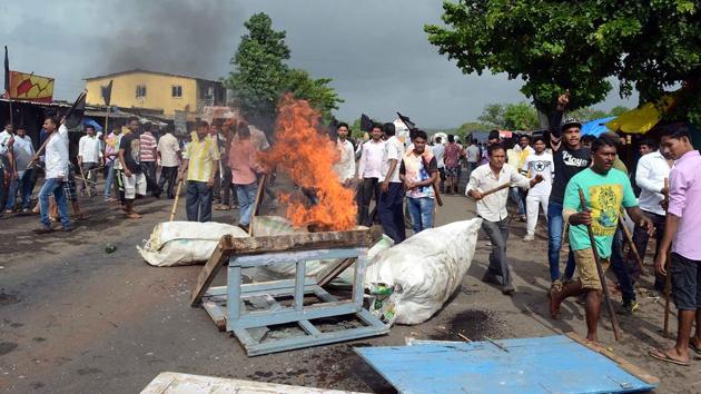 Many roads were blocked with burning tyres, rocks and vehicles. (Rishikesh Choudhary/HT PHOTO) 