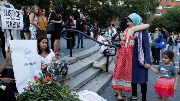 Attendees leaves flowers for Nabra Hassanen, a teenage Muslim girl killed by a bat-wielding motorist near a Virginia mosque, during a vigil in New York City, U.S. June 20, 2017.(REUTERS Photo) Attendees leaves flowers for Nabra Hassanen, a teenage Muslim girl killed by a bat-wielding motorist near a Virginia mosque, during a vigil in New York City, U.S. June 20, 2017.(REUTERS Photo)