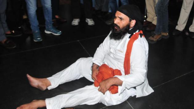 AAP MLA Jaikishan Singh protesting forceful removal from Punjab assembly at Punjab Vidhan Sabha in Chandigarh on Thursday. (Sanjeev Sharma/HT Photo) AAP MLA Jaikishan Singh protesting forceful removal from Punjab assembly at Punjab Vidhan Sabha in Chandigarh on Thursday. (Sanjeev Sharma/HT Photo)