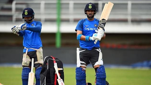 India's captain Virat Kohli (L) and Yuvraj Singh prepare to bat during a practice session. (AFP/Getty Images)