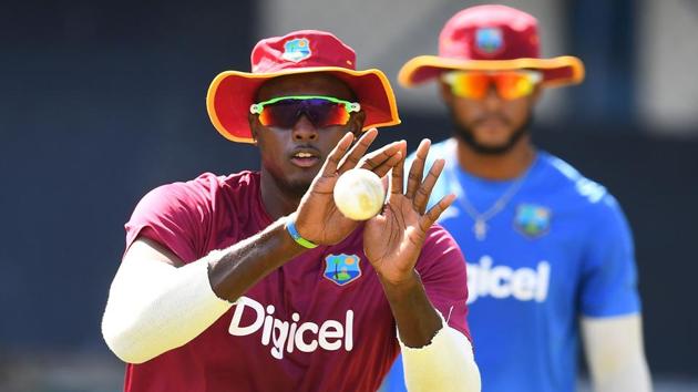 West Indies' captain Jason Holder grips a catch during a practice session. (AFP) West Indies' captain Jason Holder grips a catch during a practice session. (AFP)