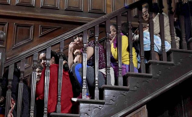 Women seen siting inside of Gymkhana Club during all hill party meeting in Darjeeling to discuss the state government’s call for an all-party meeting on the crisis. (Ashok Bhaumik/PTI) Women seen siting inside of Gymkhana Club during all hill party meeting in Darjeeling to discuss the state government’s call for an all-party meeting on the crisis. (Ashok Bhaumik/PTI)