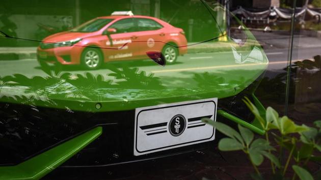 Dozens of supercars including Lamborghinis, Porsches and BMWs have been stolen from the streets of Britain and shipped to Thailand in a complex scam. (AFP) Dozens of supercars including Lamborghinis, Porsches and BMWs have been stolen from the streets of Britain and shipped to Thailand in a complex scam. (AFP)