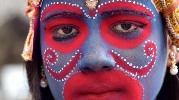 A portrait of an Indian devotee dressed as the Hindu deity Kali attends the Kamakhya Temple (AFP) A portrait of an Indian devotee dressed as the Hindu deity Kali attends the Kamakhya Temple (AFP)