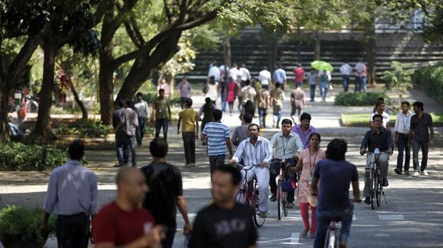 Infosys Technologies employees move through the headquarters in Bangalore. Infosys is part of the $156 billion industry that is one of the biggest job creators in India. (AP) Infosys Technologies employees move through the headquarters in Bangalore. Infosys is part of the $156 billion industry that is one of the biggest job creators in India. (AP)
