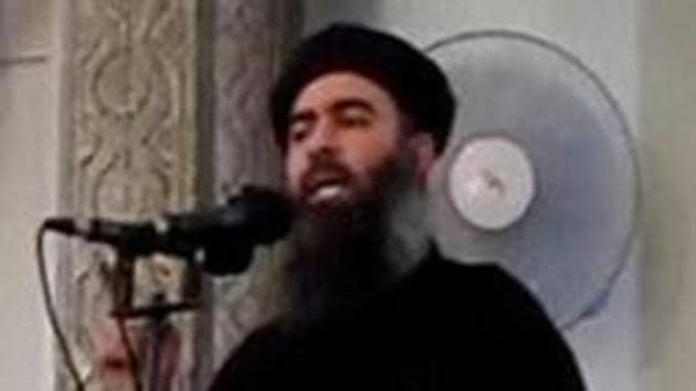 File photo of the reclusive leader of the Islamic State, Abu Bakr al-Baghdadi, making what would have been his first public appearance at a mosque in the centre of Iraq's second city, Mosul, on July 5, 2014.(Reuters) File photo of the reclusive leader of the Islamic State, Abu Bakr al-Baghdadi, making what would have been his first public appearance at a mosque in the centre of Iraq's second city, Mosul, on July 5, 2014.(Reuters)