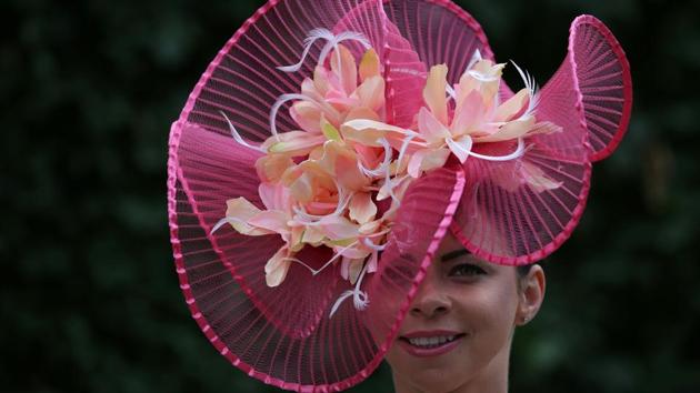 Racegoers are encouraged to make a special effort with their outfits for Ladies’ Day, which is as much a social occasion as a major sporting event for top owners, trainers and jockeys. (Daniel LEAL-OLIVAS / AFP) Racegoers are encouraged to make a special effort with their outfits for Ladies’ Day, which is as much a social occasion as a major sporting event for top owners, trainers and jockeys. (Daniel LEAL-OLIVAS / AFP)