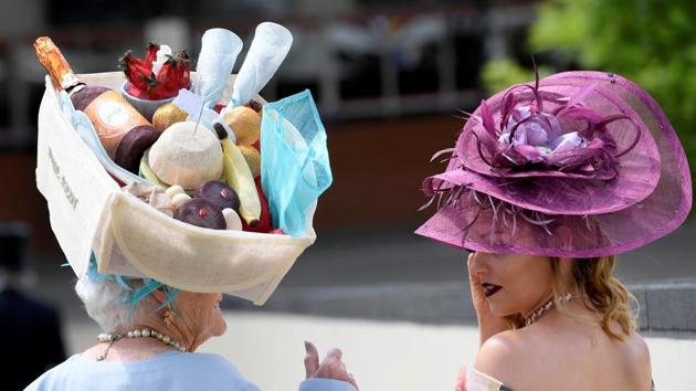 Racegoer Anne Hudson from St. Helens wears a hat shaped like a picnic basket. (Toby Melville / Reuters) Racegoer Anne Hudson from St. Helens wears a hat shaped like a picnic basket. (Toby Melville / Reuters)