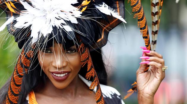 A racegoer poses during Ladies Day at Ascot. Ascot Racecourse was founded in 1711 by Queen Anne. (Action Images via Reuters) A racegoer poses during Ladies Day at Ascot. Ascot Racecourse was founded in 1711 by Queen Anne. (Action Images via Reuters)