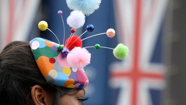 Quirky headpieces with multi-coloured pom pom were spotted on many racegoers. (Toby Melville / Reuters) Quirky headpieces with multi-coloured pom pom were spotted on many racegoers. (Toby Melville / Reuters)