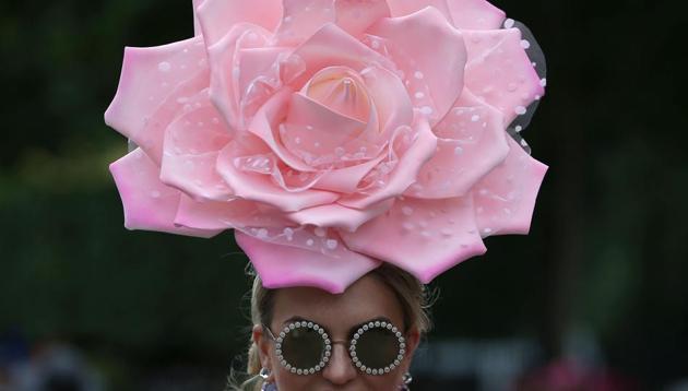 Ladies Day at Royal Ascot — a prime event on the fashion calendar when racegoers meet royalty at the famous track in one of the wealthiest parts of the UK. The five-day meeting is one of the highlights of the horse racing calendar. (Daniel LEAL-OLIVAS / AFP) Ladies Day at Royal Ascot — a prime event on the fashion calendar when racegoers meet royalty at the famous track in one of the wealthiest parts of the UK. The five-day meeting is one of the highlights of the horse racing calendar. (Daniel LEAL-OLIVAS / AFP)