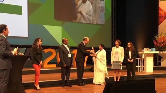 Bengal chief minister Mamata Banerjee receiving the award at a function on Friday in The Hague. (Facebook) Bengal chief minister Mamata Banerjee receiving the award at a function on Friday in The Hague. (Facebook)