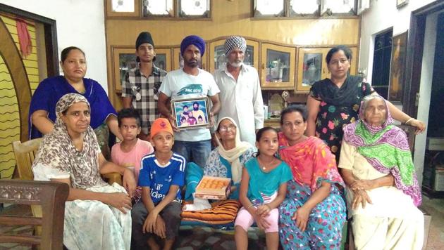 Family members of Palbinder Kaur Shergill celebrating her appointment as the first turbaned (Amritdhari) Sikh woman judge of the Supreme Court of British Columbia in New Westminster at their house in Jagatpur village of SBS Nagar district. (HT Photo) Family members of Palbinder Kaur Shergill celebrating her appointment as the first turbaned (Amritdhari) Sikh woman judge of the Supreme Court of British Columbia in New Westminster at their house in Jagatpur village of SBS Nagar district. (HT Photo)