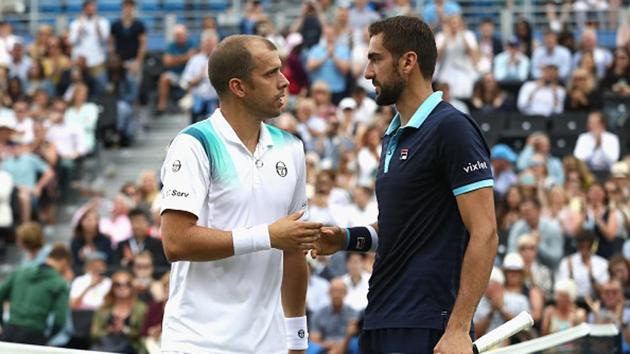 Marin Cilic shakes hands with Gilles Muller after the semi-final at the Queens Club Championship. (Getty Images) Marin Cilic shakes hands with Gilles Muller after the semi-final at the Queens Club Championship. (Getty Images)