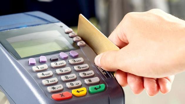 The agreement retailers sign with banks for card-swipe devices — technically called point-of-sale (POS) terminals — contains a clause forbidding them from charging customers for the facility.(Shutterstock)