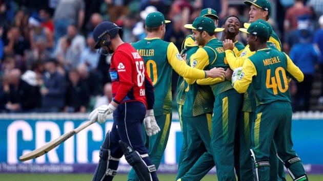 South Africa players celebrate their win as England's Liam Dawson looks on.(REUTERS)