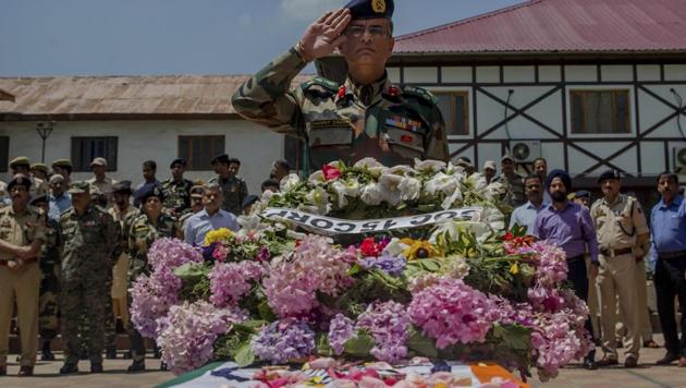 An Indian army officer salutes during the wreath-laying ceremony of Mohammad Ayoub Pandit, a policeman who was beaten to death, at the police headquarters in Srinagar, Friday, June 23, 2017. (AP) An Indian army officer salutes during the wreath-laying ceremony of Mohammad Ayoub Pandit, a policeman who was beaten to death, at the police headquarters in Srinagar, Friday, June 23, 2017. (AP)