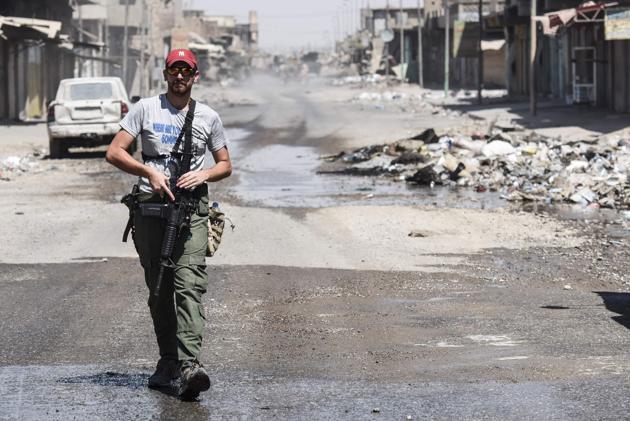 An Iraqi forces member patrols Mosul’s industrial zone. (AFP) An Iraqi forces member patrols Mosul’s industrial zone. (AFP)
