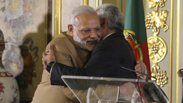 Prime Ministers Narendra Modi (left) with Antonio Costa embrace after a joint statement at the Necessidades Palace, the Portuguese foreign ministry in Lisbon, on June 24, 2017.(AP Photo) Prime Ministers Narendra Modi (left) with Antonio Costa embrace after a joint statement at the Necessidades Palace, the Portuguese foreign ministry in Lisbon, on June 24, 2017.(AP Photo)