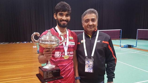 Kidambi Srikanth poses with the Indian team manager after his Australian Open Superseries win in Sydney on Sunday.(BAI Media)