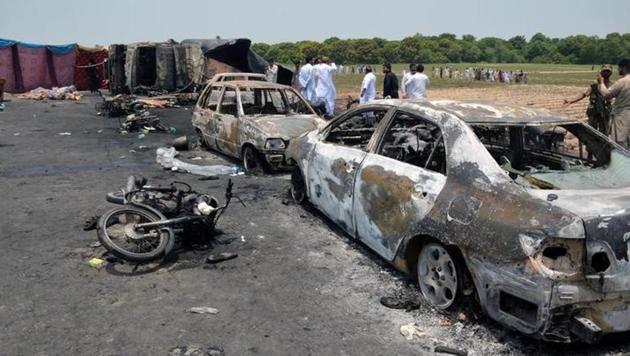 Burnt cars and motorcycles at the scene of an oil tanker explosion in Bahawalpur in Pakistan. (REUTERS) Burnt cars and motorcycles at the scene of an oil tanker explosion in Bahawalpur in Pakistan. (REUTERS)