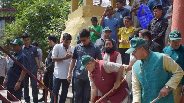 Chief minister Trivendra Singh Rawat takes part in a cleanliness drive in Dehradun on Sunday. (PTI Photo) Chief minister Trivendra Singh Rawat takes part in a cleanliness drive in Dehradun on Sunday. (PTI Photo)
