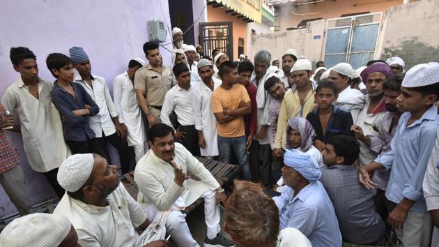 Local residents gather outside the residence of Hafiz Junaid in Faridabad on Friday.(Ravi Choudhary/HT PHOTO) Local residents gather outside the residence of Hafiz Junaid in Faridabad on Friday.(Ravi Choudhary/HT PHOTO)