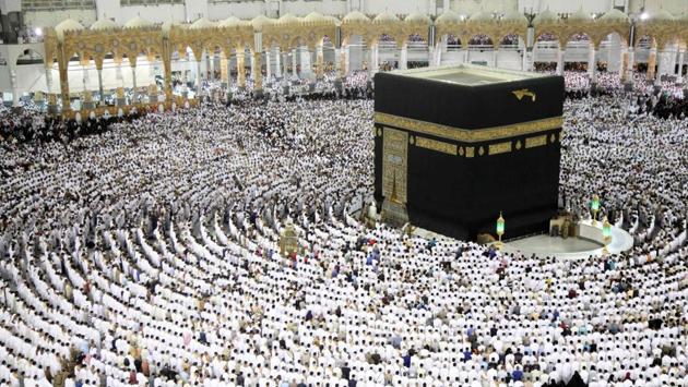 Muslim worshippers pray at the Kaaba, Islam's holiest shrine, at the Grand Mosque in Saudi Arabia's holy city of Mecca on June 23, 2017, during the last Friday of the holy month of Ramadan. (Bandar Aldandani/AFP)