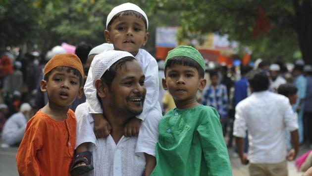 Family celebrating Eid-ul-Fitr in Chandigarh on Monday. Eid-ul-Fitr is also known as `sweet Eid’ because of the variety of sweet dishes being cooked and consumed on this day. (Karun Sharma/HT Photo) 
