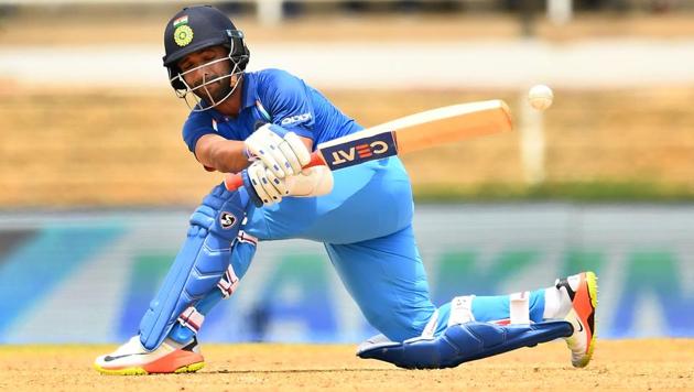 India's Ajinkya Rahane plays a shot during the second One Day International (ODI) match between West Indies and India at the Queen's Park Oval in Port of Spain, Trinidad.(AFP)