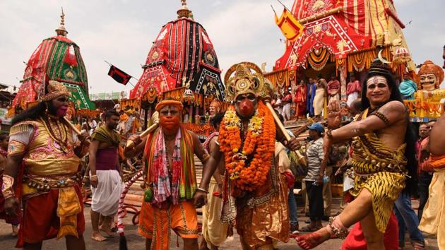 Devotees dressed up as various mythological figures near the main gate of the Puri temple. (Arabinda Mahapatra/HT Photo) Devotees dressed up as various mythological figures near the main gate of the Puri temple. (Arabinda Mahapatra/HT Photo)