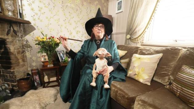 Harry Potter fan Maria York poses in her Professor McGonagall costume at her home in Grays, Britain. (Neil Hall/Reuters)