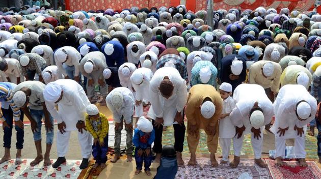Muslims offering namaz on the occasion of Eid-ul-Fitr in Ludhiana on Monday. The festival of Eid, celebrated by Muslims across the world, marks the end of Ramzan, the holy month of fasting in the Islamic calendar when the Quran was first revealed to Prophet Muhammad. (Jagtinder Singh Grewal /HT Photo) Muslims offering namaz on the occasion of Eid-ul-Fitr in Ludhiana on Monday. The festival of Eid, celebrated by Muslims across the world, marks the end of Ramzan, the holy month of fasting in the Islamic calendar when the Quran was first revealed to Prophet Muhammad. (Jagtinder Singh Grewal /HT Photo)