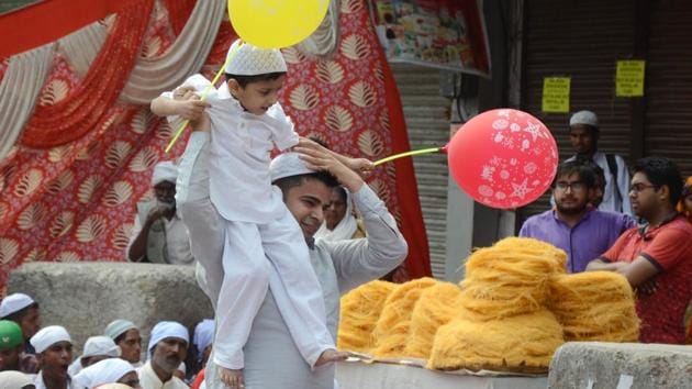 Worshippers celebrating Eid in Ludhiana on Monday. Celebrations traditionally begin with Chand Raat, the evening before the day of Eid, when people go for Eid shopping. (Jagtinder Singh Grewal /HT Photo) Worshippers celebrating Eid in Ludhiana on Monday. Celebrations traditionally begin with Chand Raat, the evening before the day of Eid, when people go for Eid shopping. (Jagtinder Singh Grewal /HT Photo)