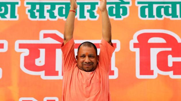 UP CM Yogi Adityanath performs yoga during a practice session in Lucknow.(Reuters File Photo)