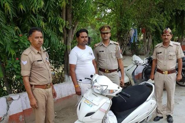 The man, Pankaj Sharma, was held with his two-wheeler that had the word ‘police’ written on it.
